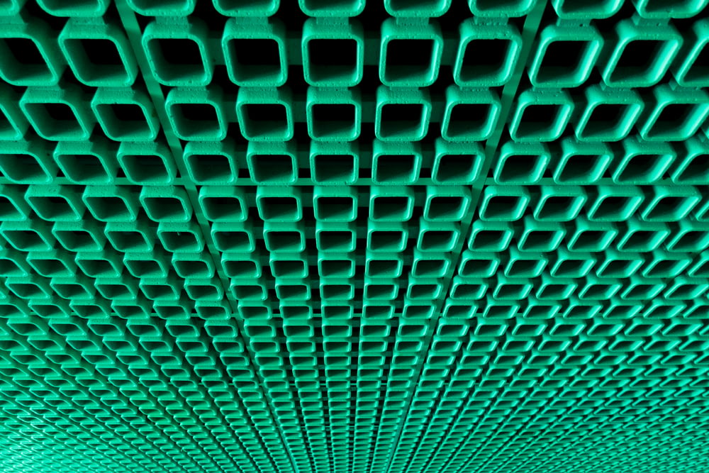 green surface with holes