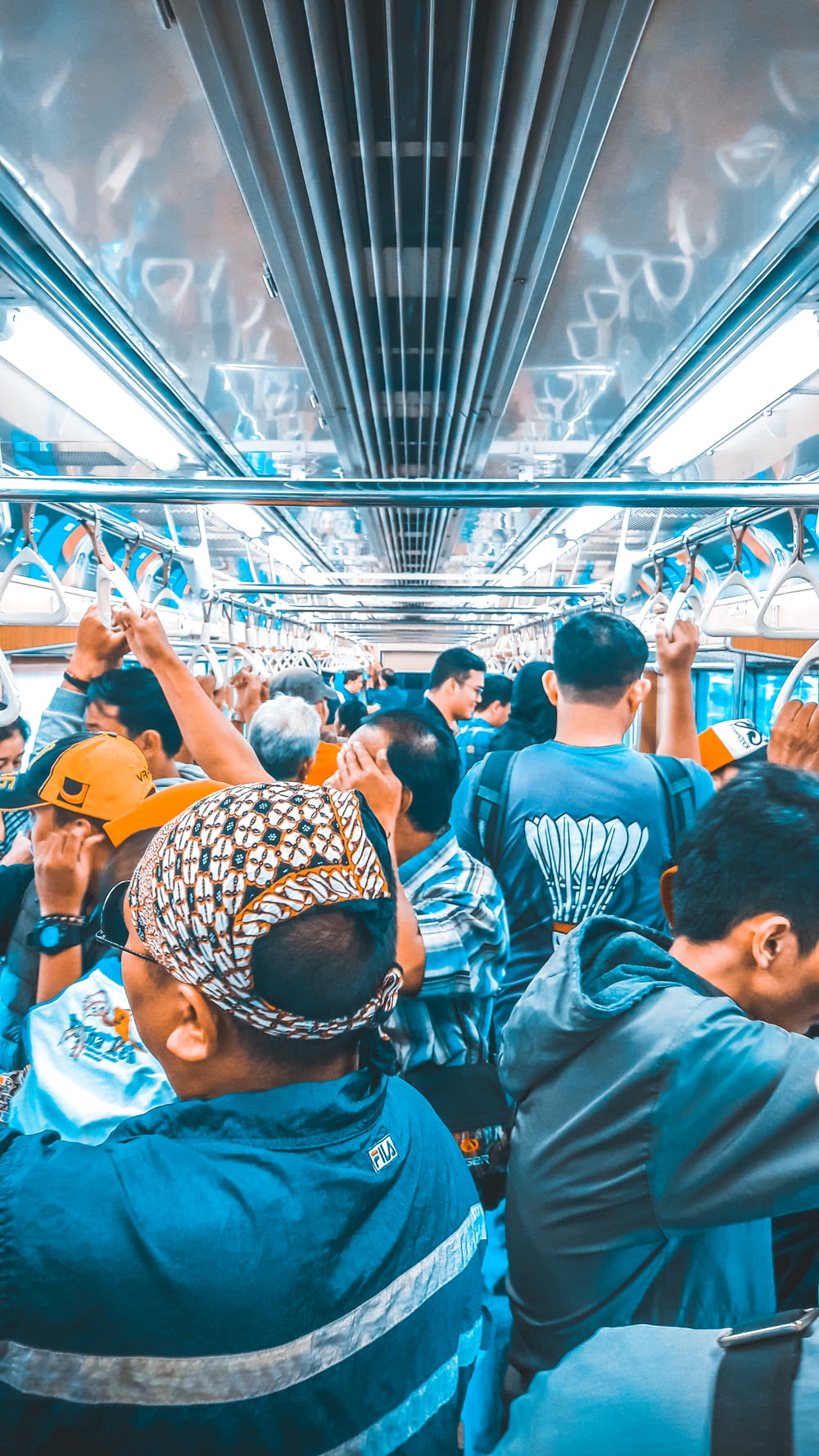 crowd of people inside train