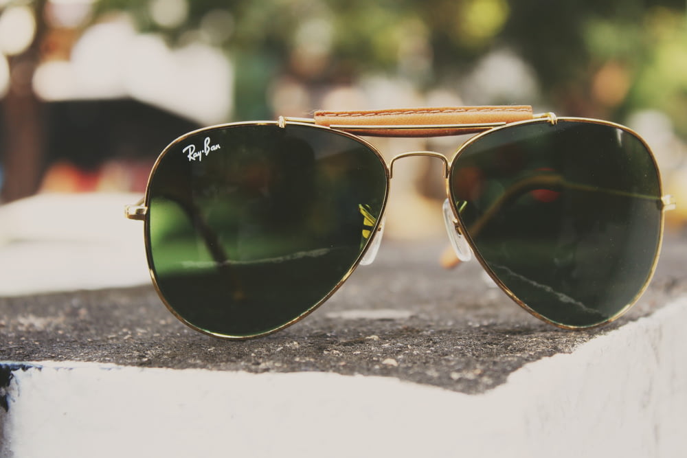 gold Ray-Ban Aviator sunglasses