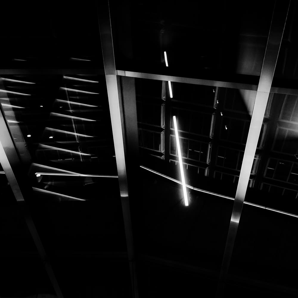 a black and white photo of some lights