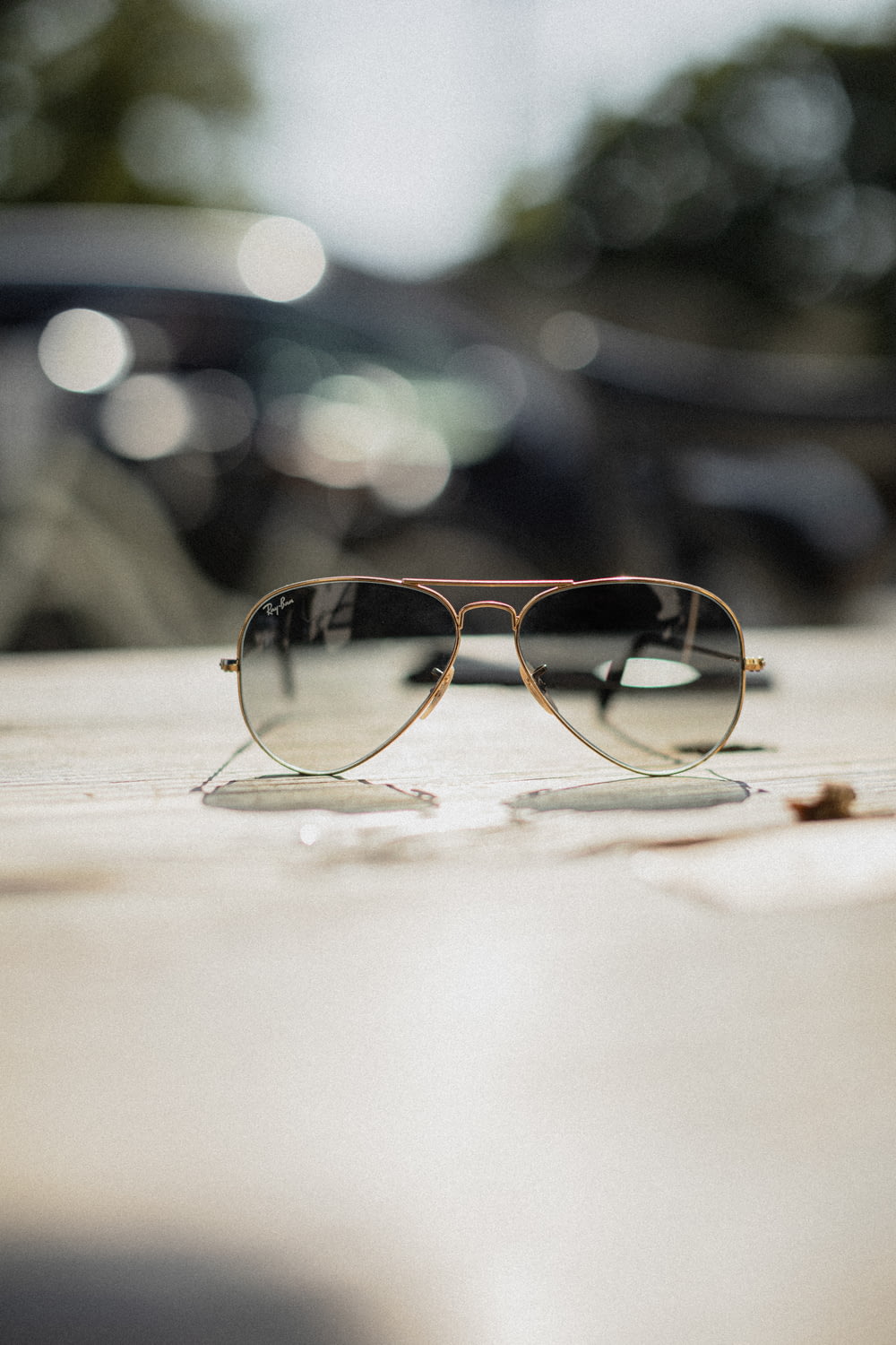 gold-framed Aviator-style sunglasses