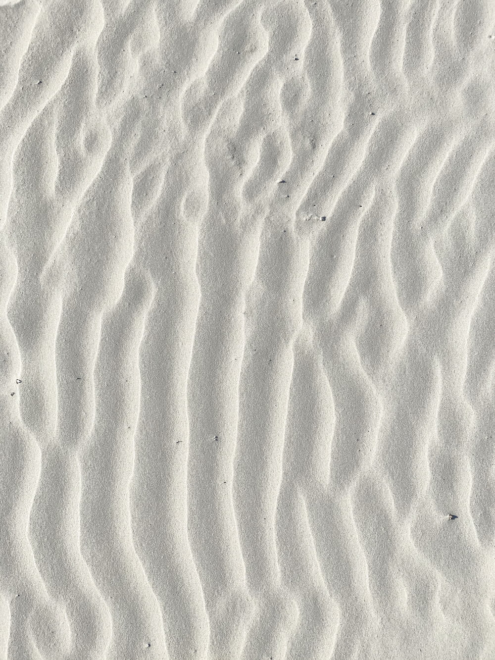 macro photography of white sand