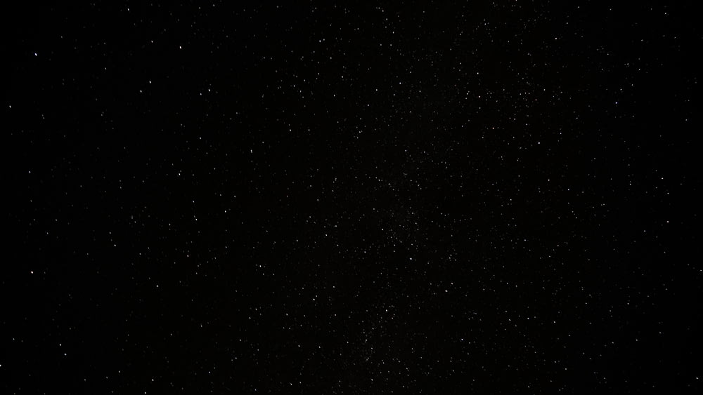 a black sky with a lot of stars