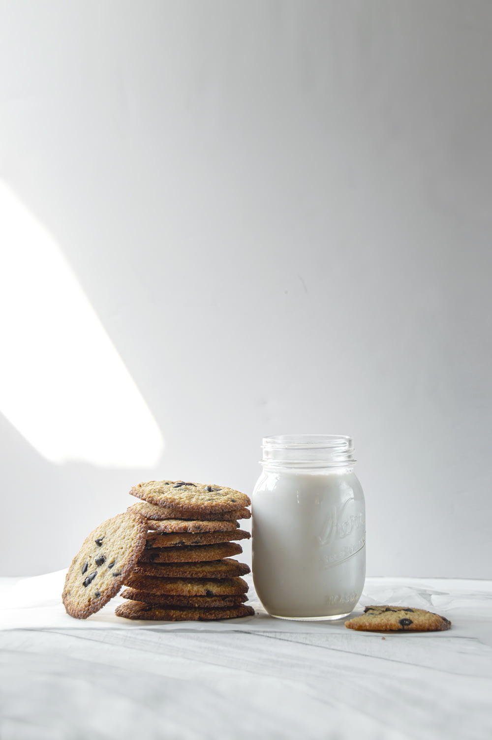 cookies beside milk jar