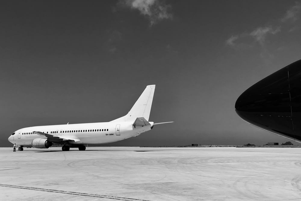 greyscale photography of airplane