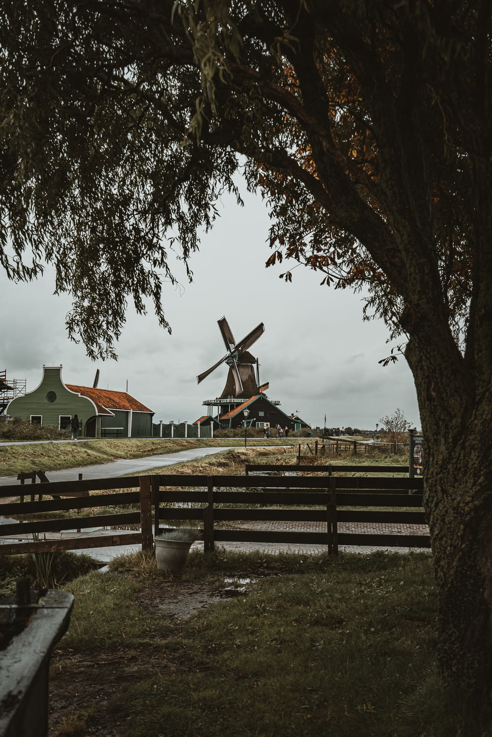 brown and grey windmill during daytime