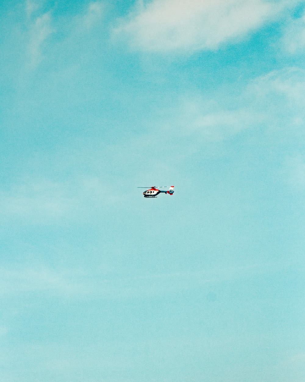 red and white helicopter