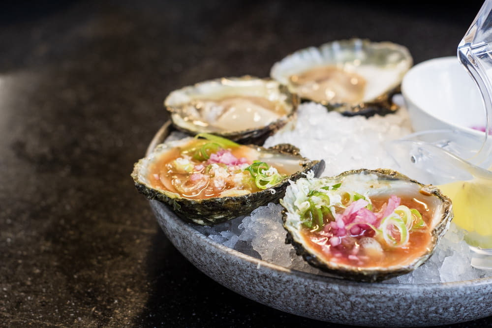 oysters at a gray plate
