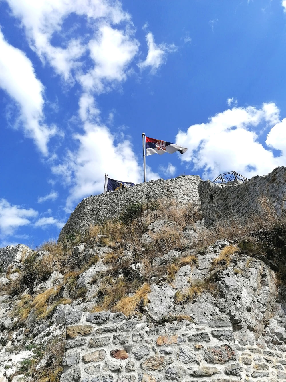 flag on top of rock formation