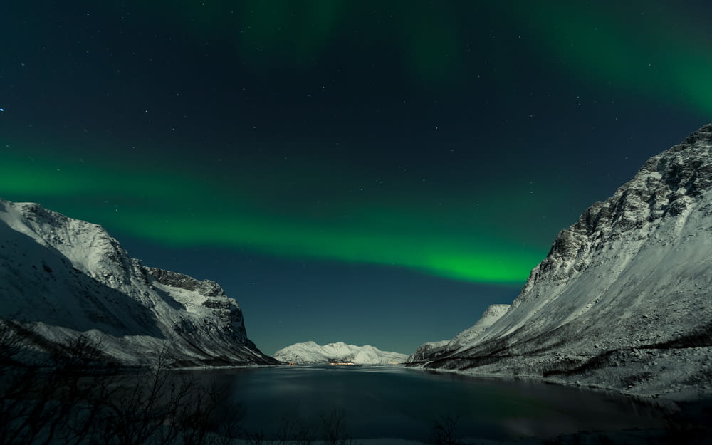 aurora borealis and icy mountain scenery