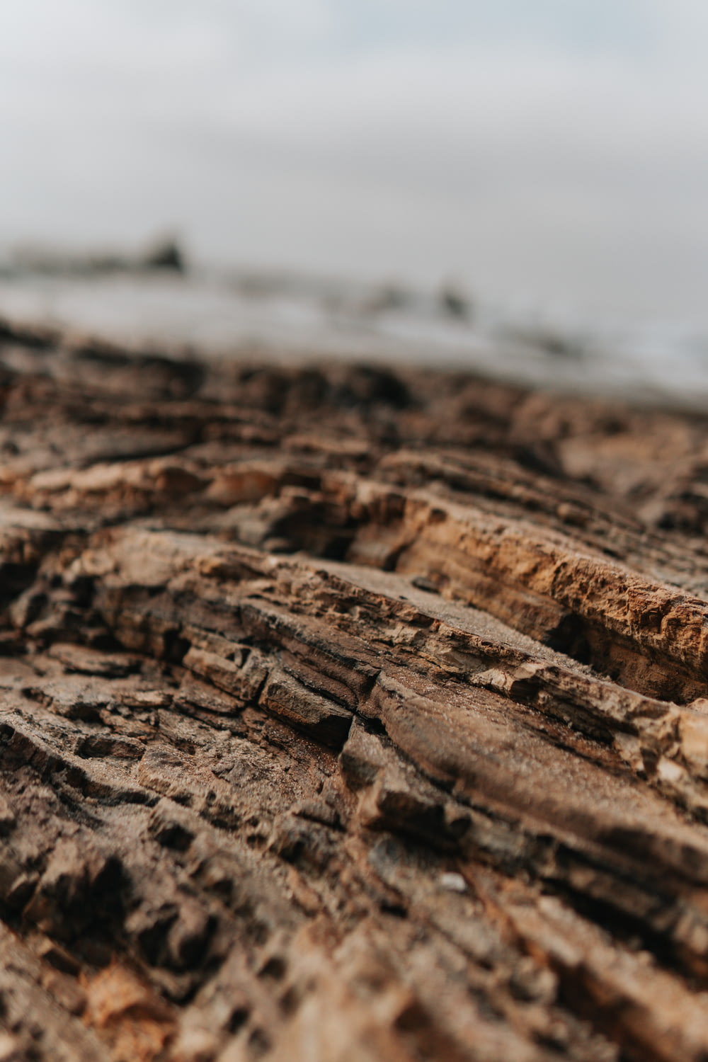 a close up of rocks on a beach