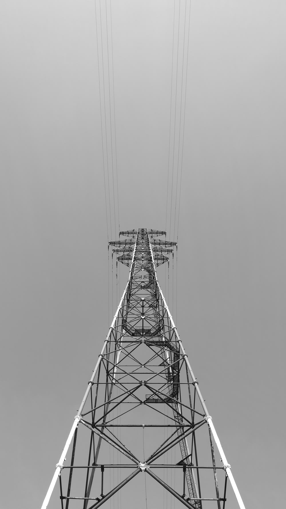 greyscale photography of metal tower