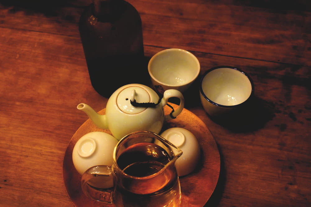 white teapot on tray