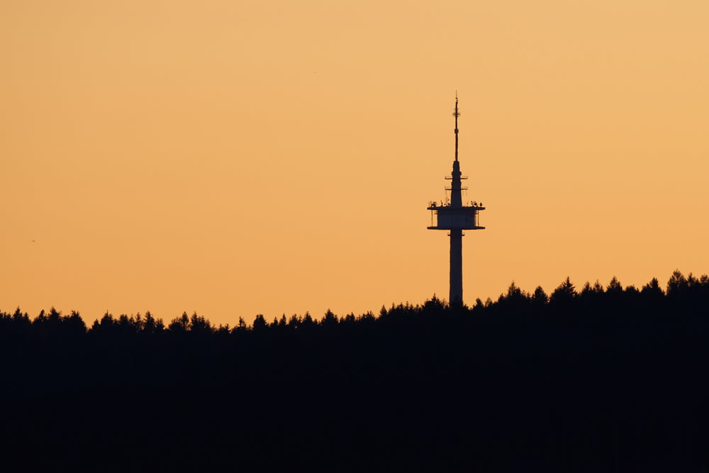 silhouette photography of tower