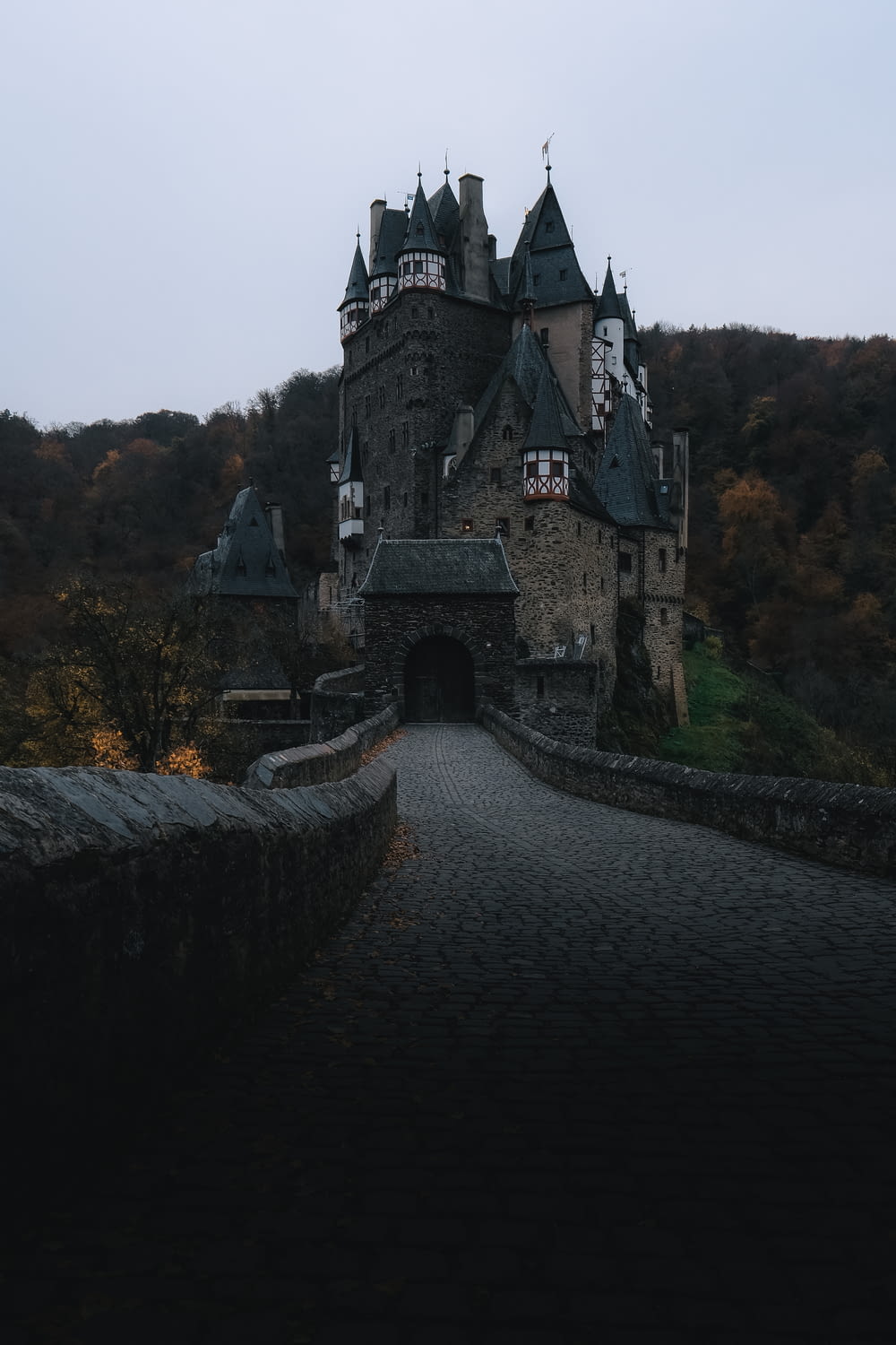 gray castle near mountain during daytime