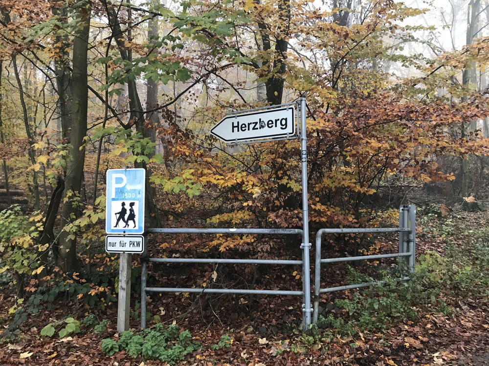 gray metal Herzberg signage