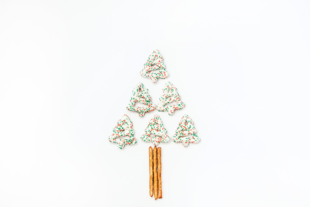 a small christmas tree made out of candy canes