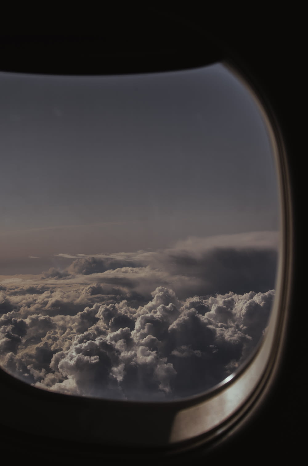 a view of the clouds from an airplane window