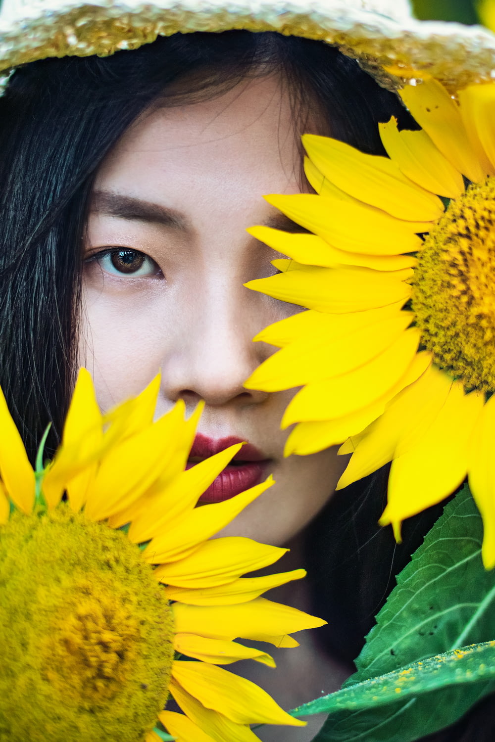 woman with yellow Sunflower flowers