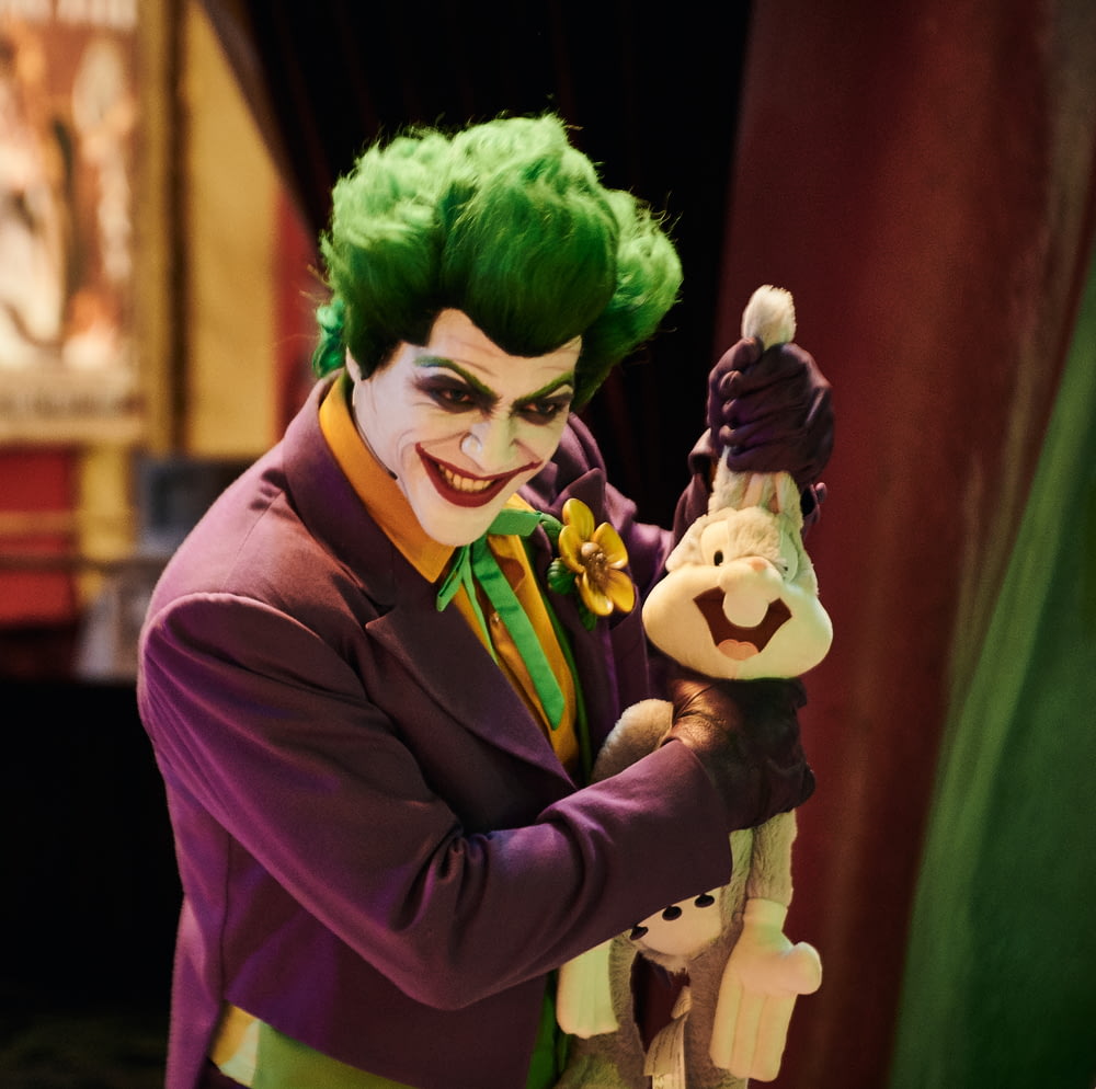 man wearing The Joker costume
