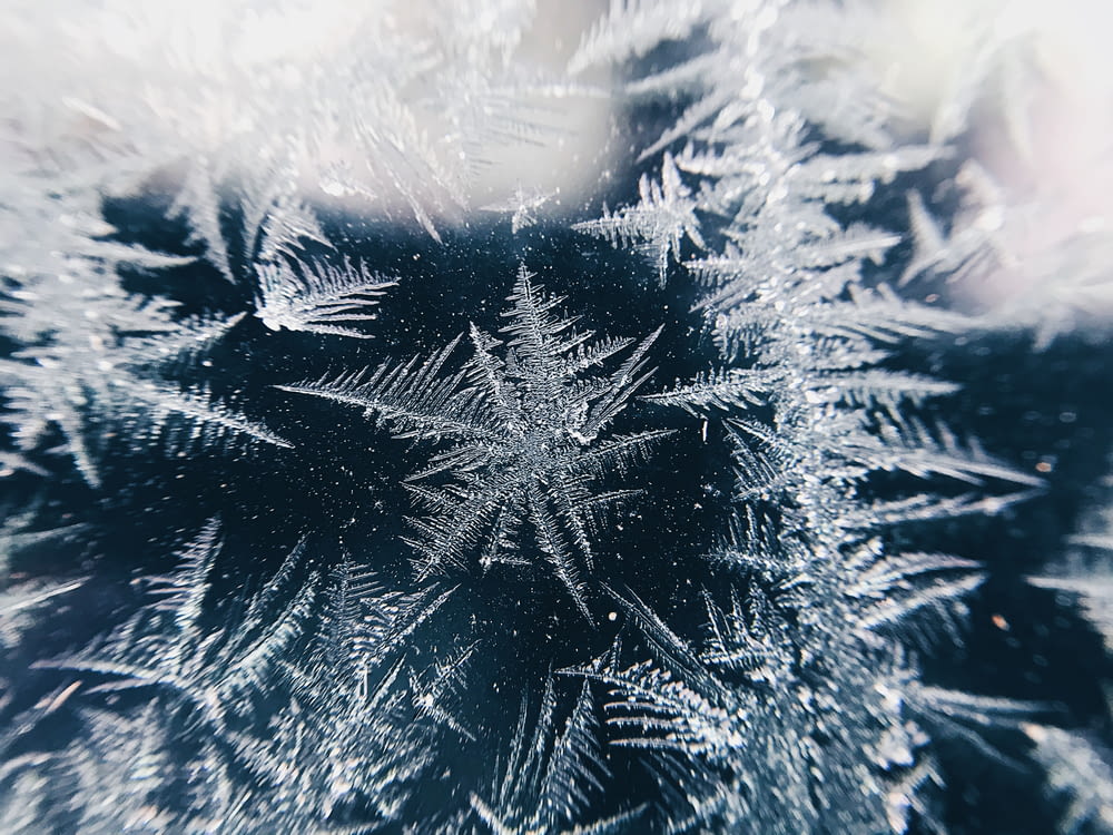 a close up view of a frosted window