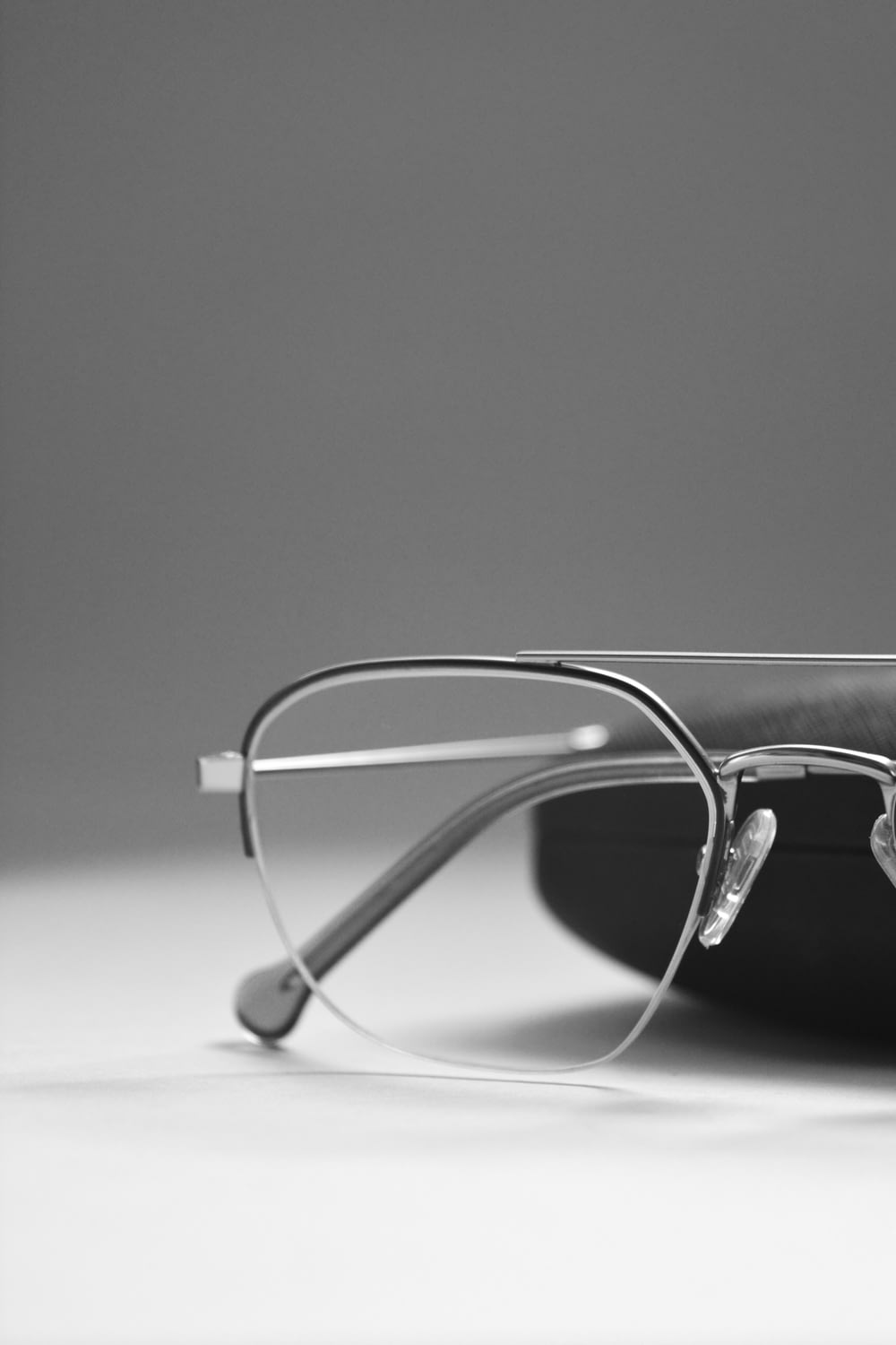 eyeglasses on white surface