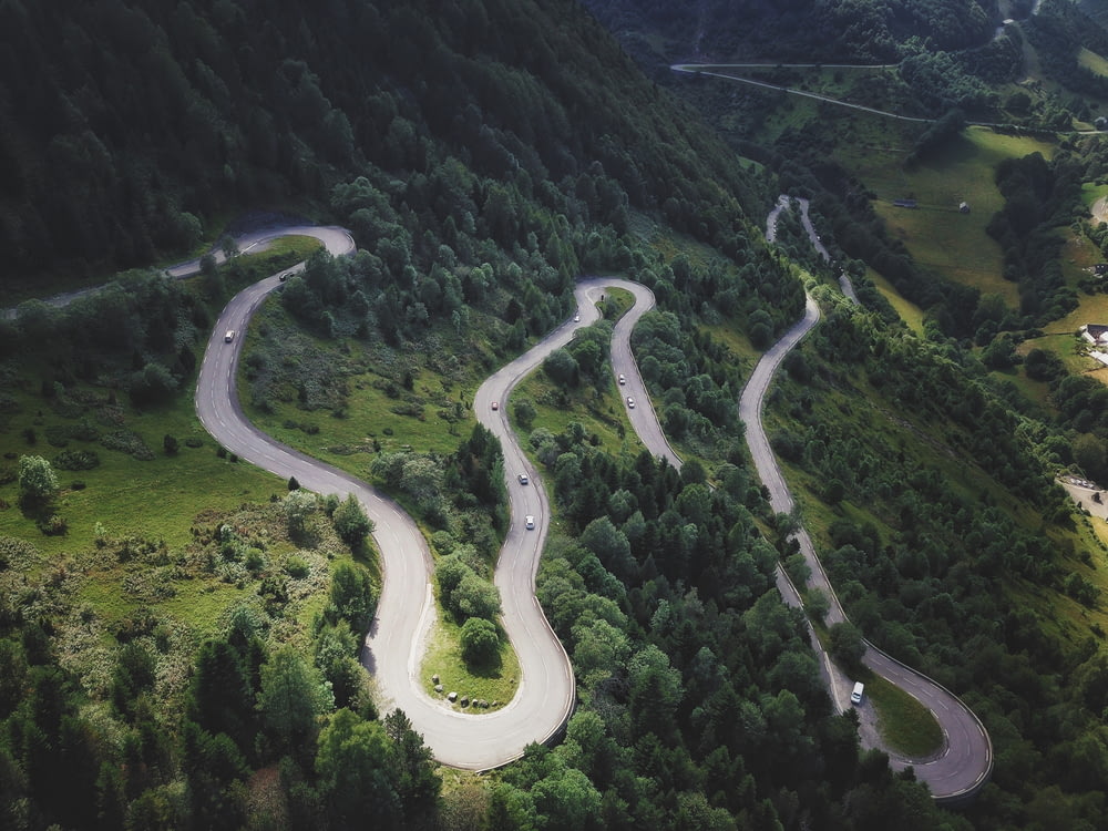 aerial photography of winding road in the mountain