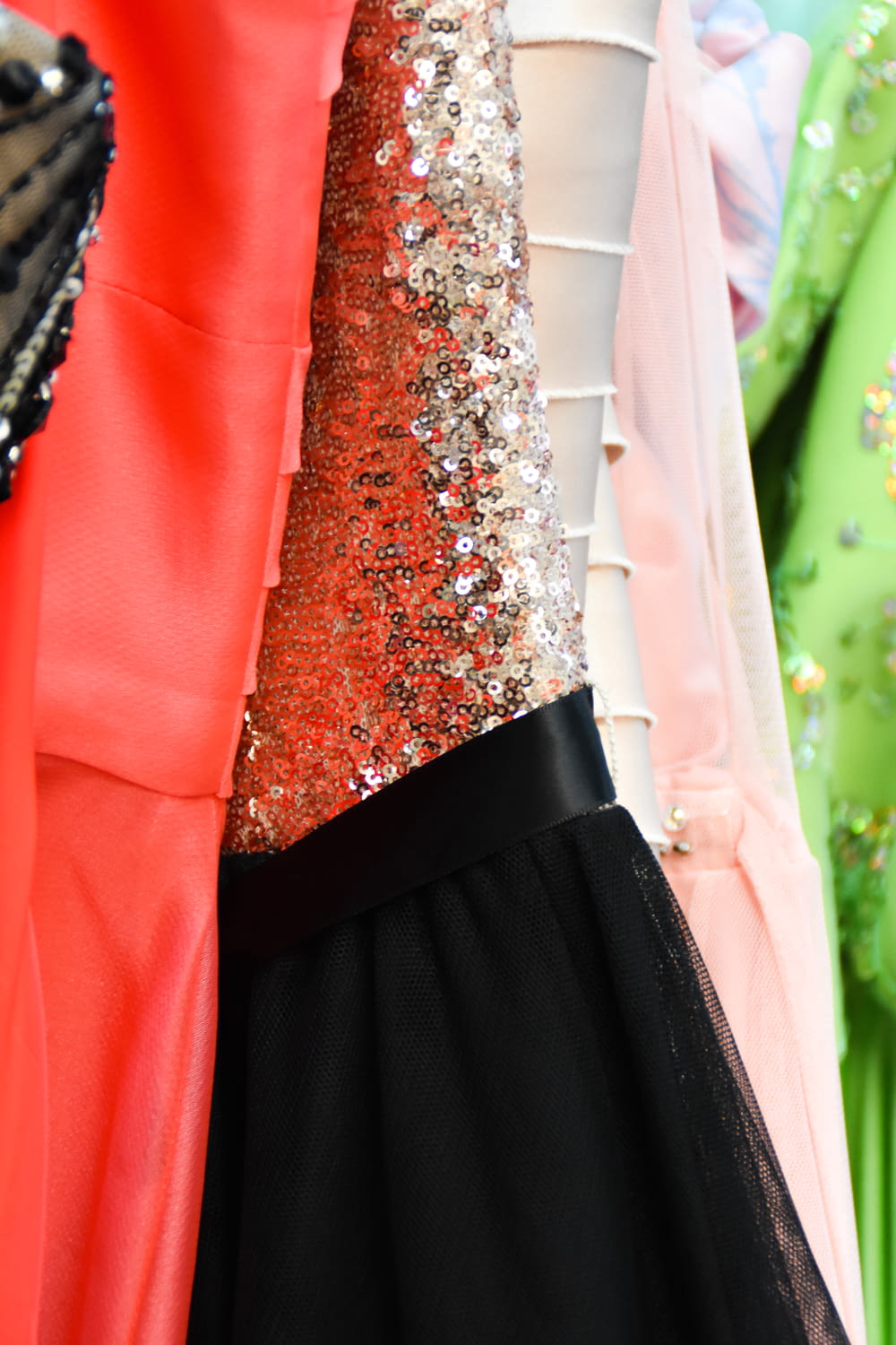 a close up of a dress with sequins on it