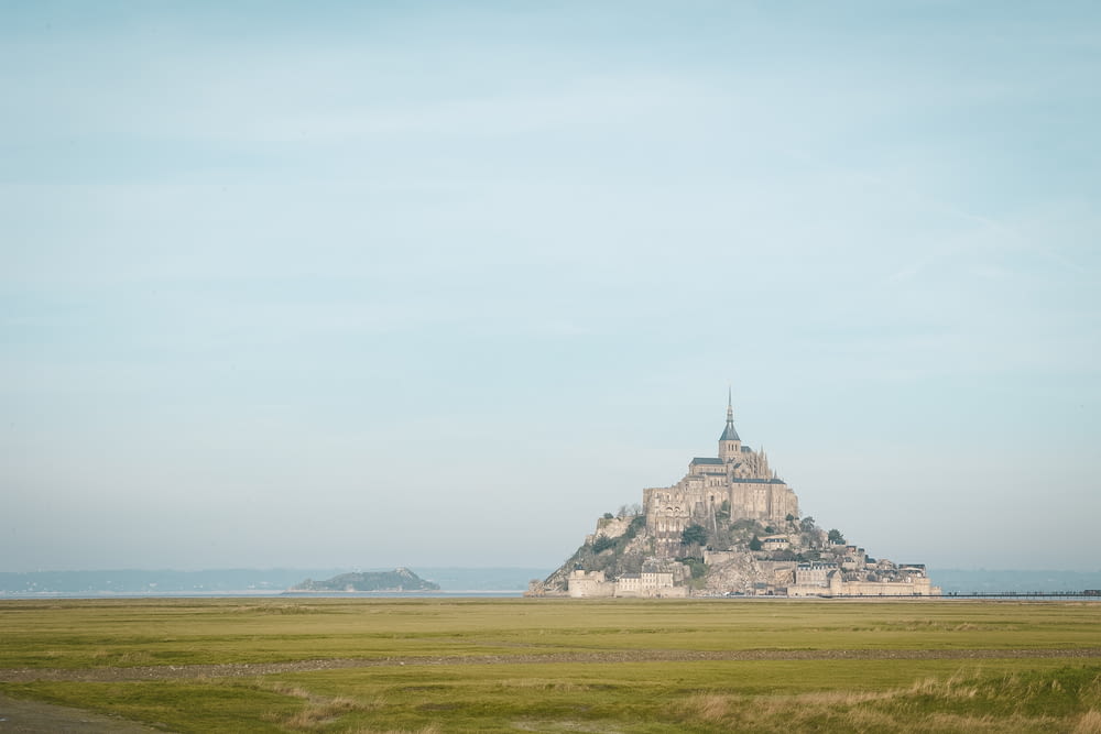Mont Saint Michel in France under blue and white sky