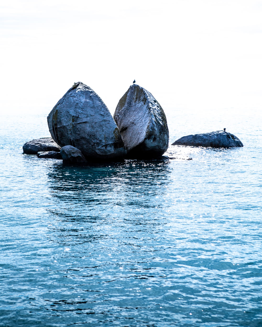 gray rocks on water