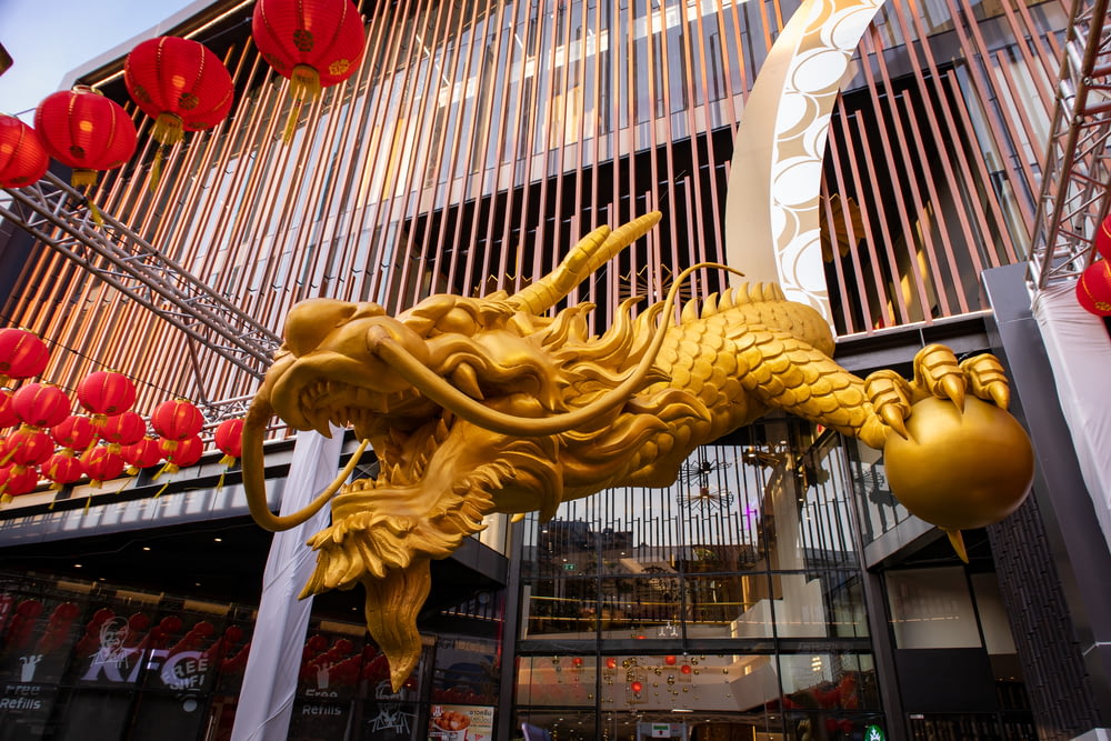 gold dragon statue in building