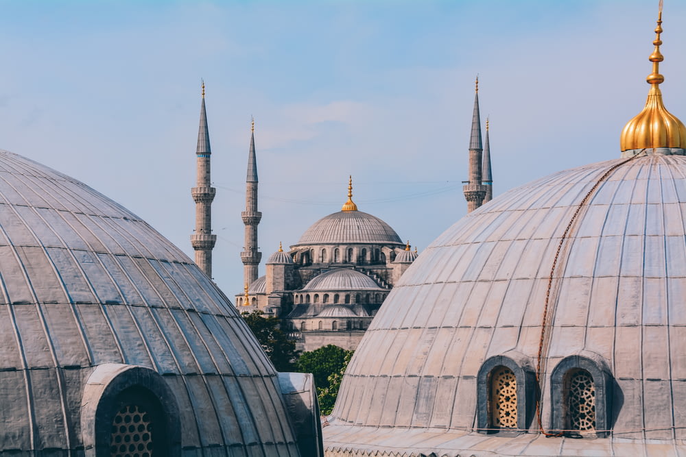 a group of domes with a sky background