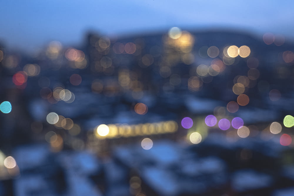 bokeh photography of city lights during night time
