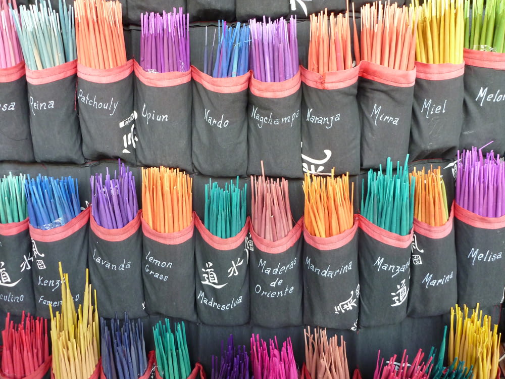 stack of black and pink makeup brushes