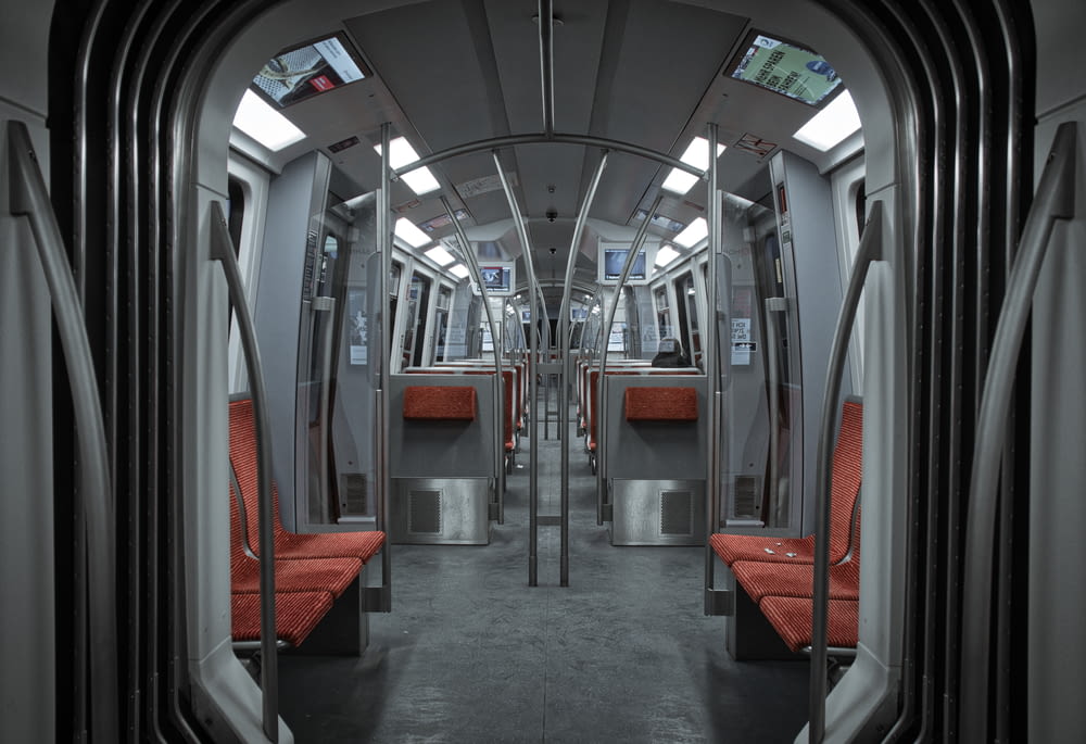 red and gray train seats