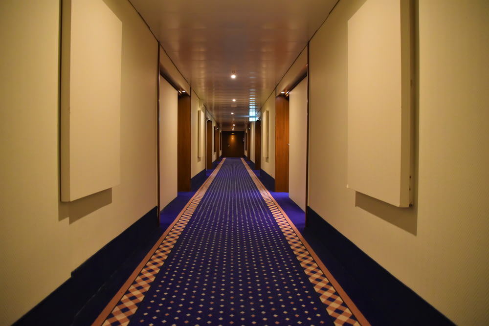 blue and red carpet on hallway