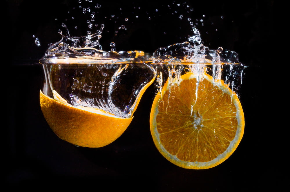 orange fruit in water with water