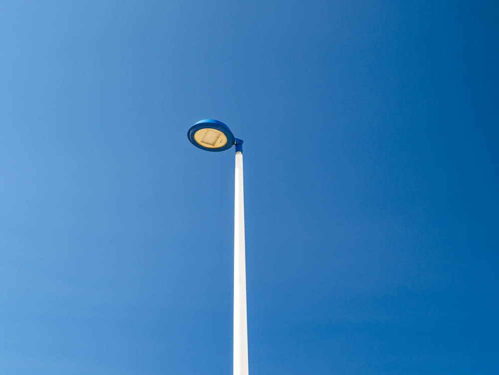 blue and black round light under blue sky during daytime