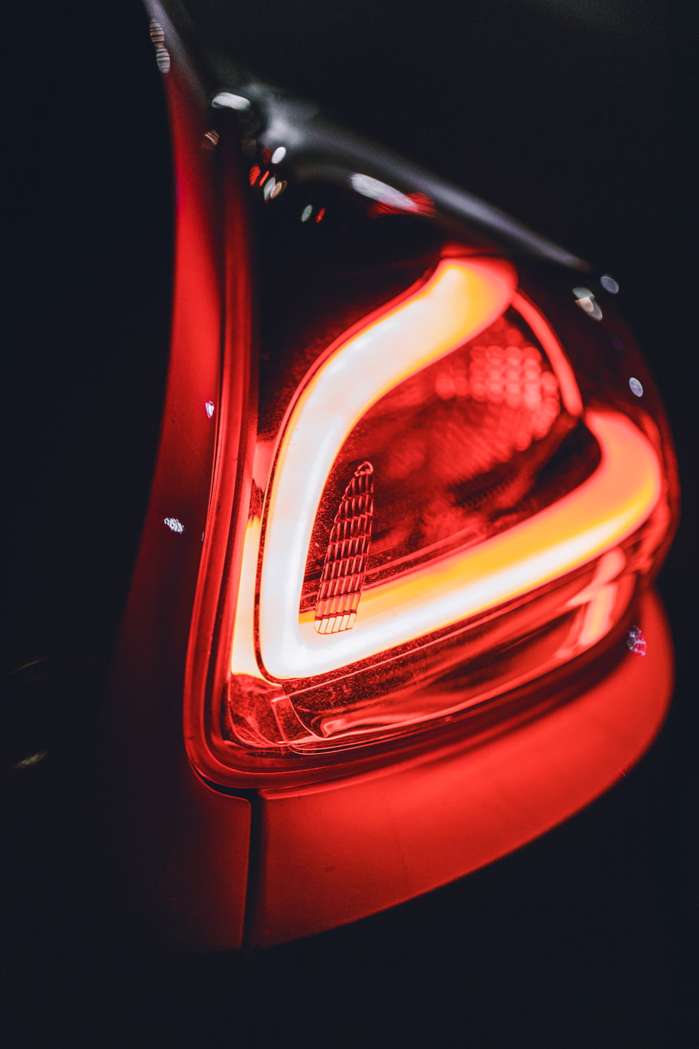 red and black car tail light