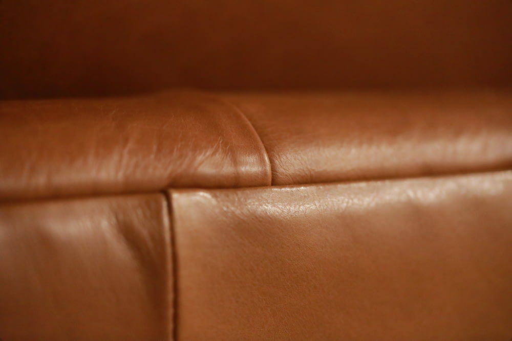 brown leather textile in close up photography