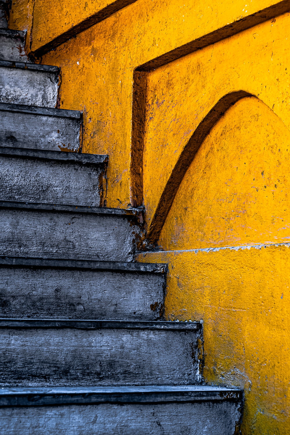 blue and yellow concrete staircase