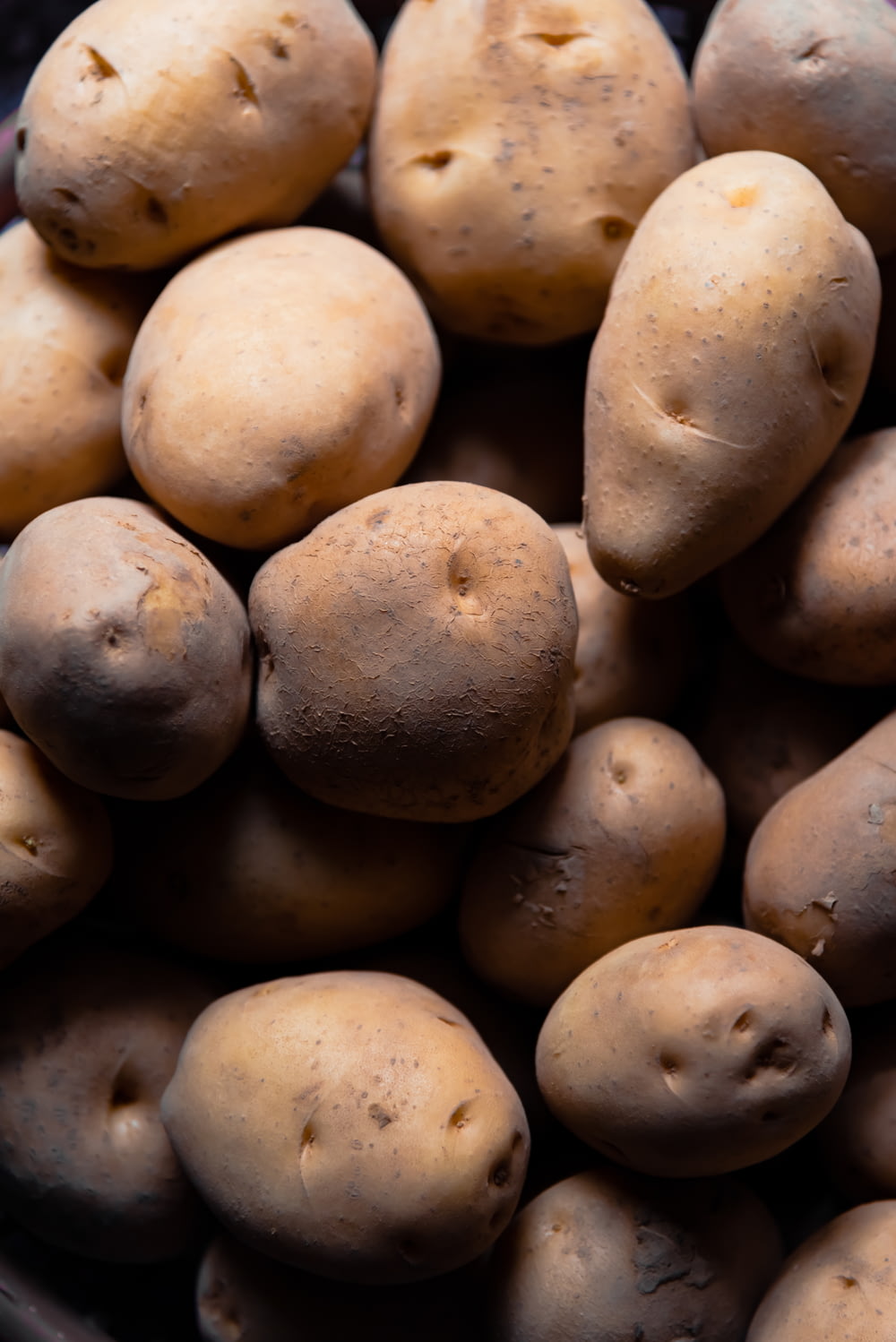 brown potatoes in close up photography