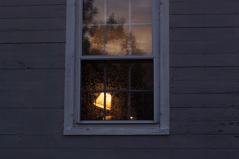 white wooden framed glass window