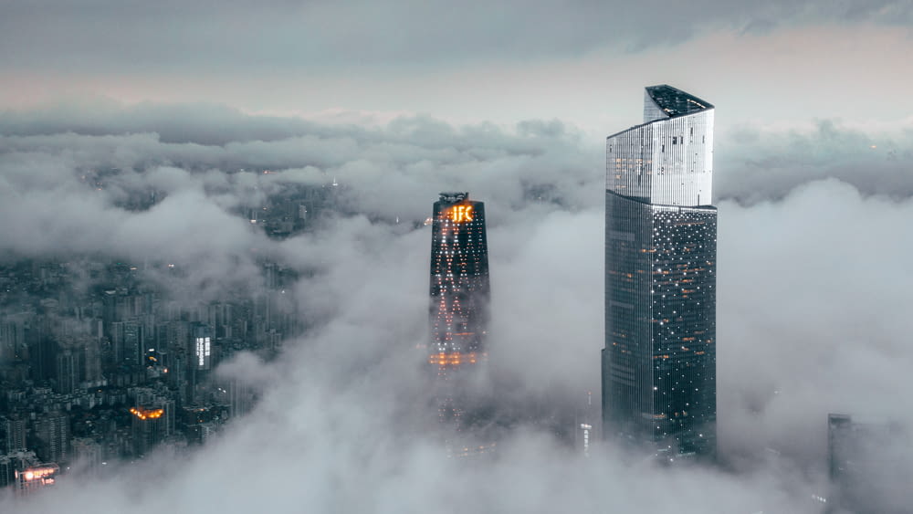 high rise building covered with fog