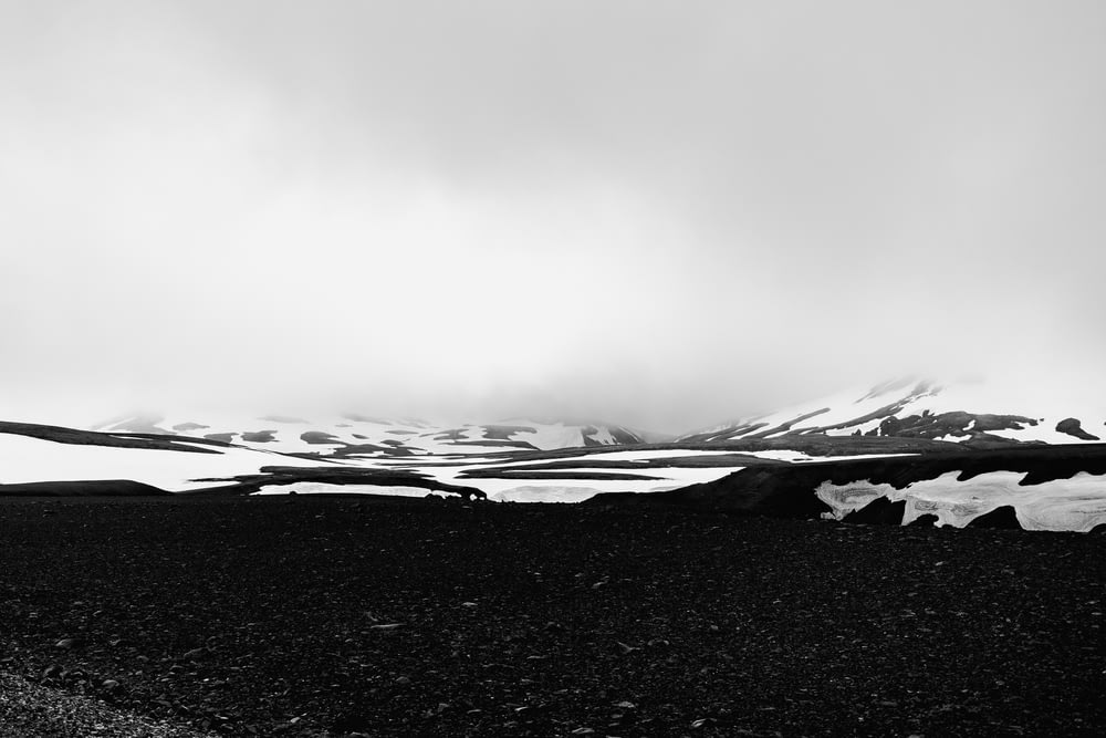 grayscale photo of mountain ranges