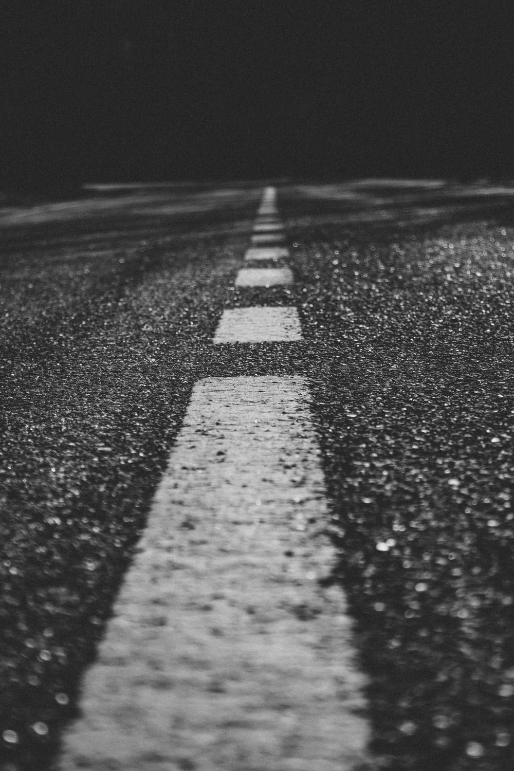grayscale photo of empty road