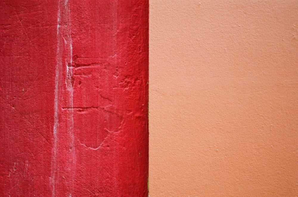 red concrete wall during daytime