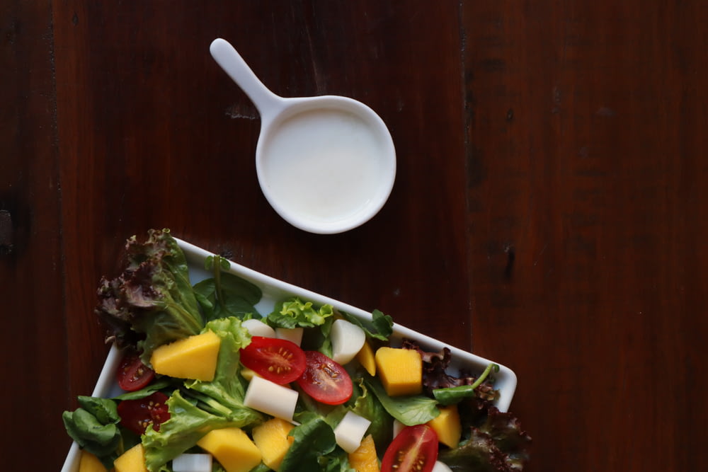 white ceramic bowl with vegetable salad