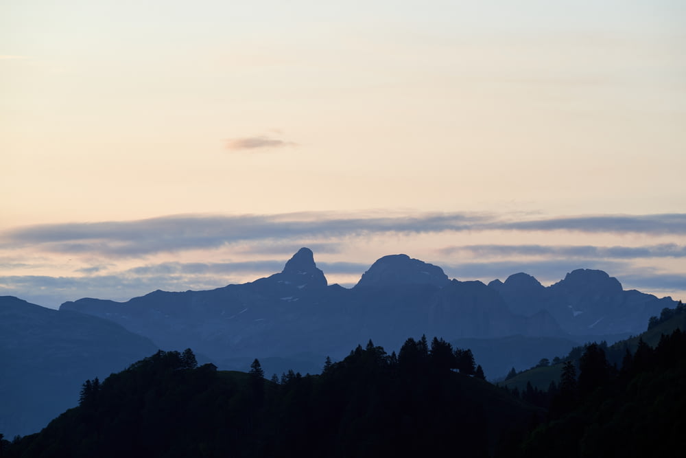 silhouette of mountains during daytime