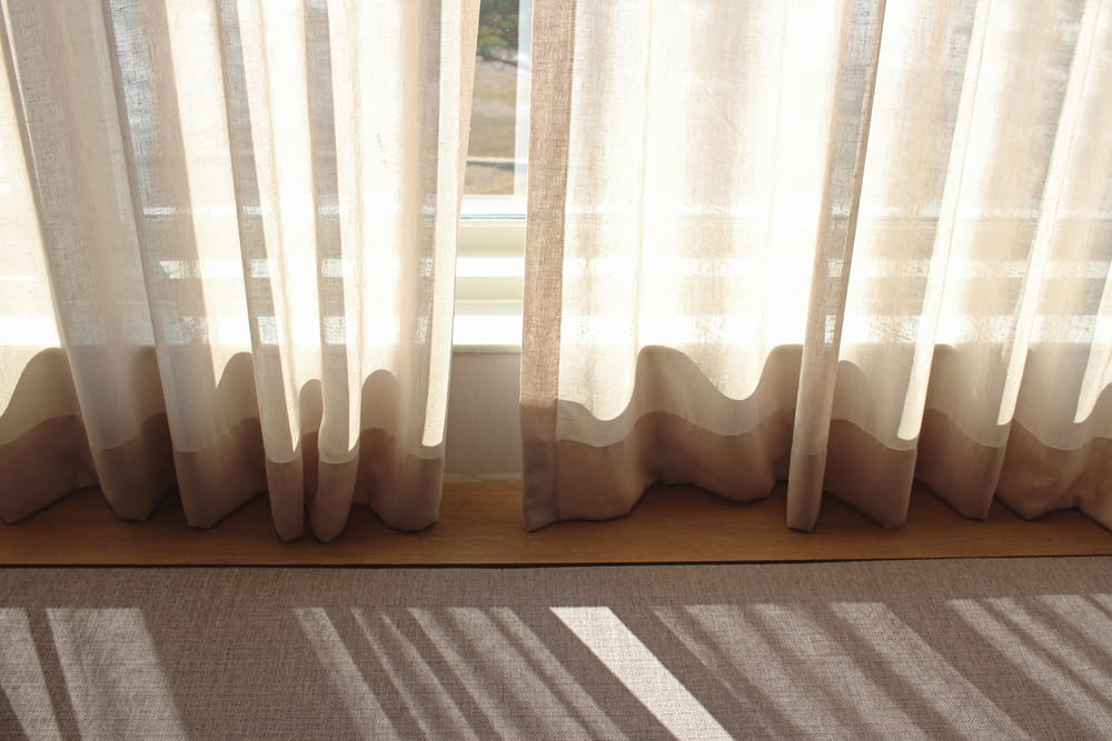 white window curtain during daytime